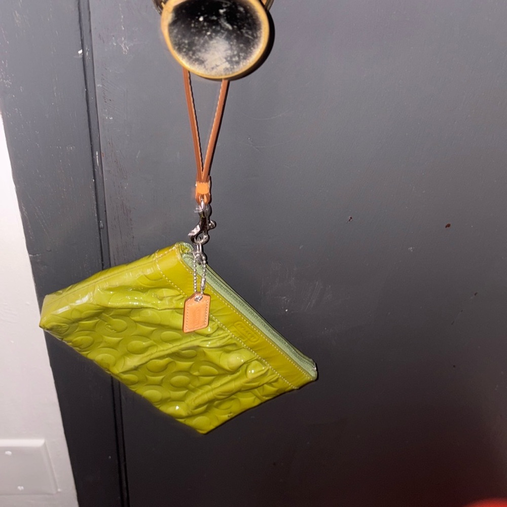 Coach olive green wristlet used. smoke free home